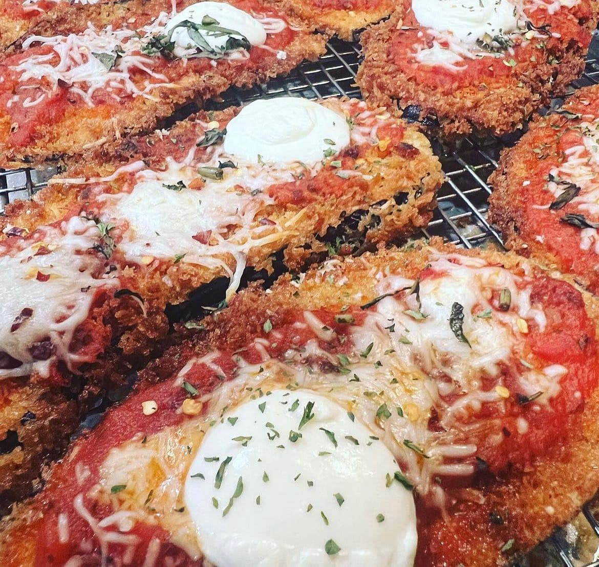 Alabao Eats breaded cutlets with tomato and mozzarella for Cape Coral catering